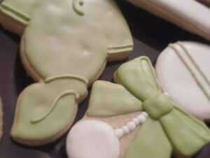 baby shower a new chapter themed decorated cookies