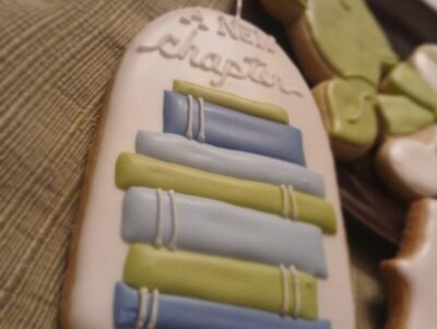 baby shower a new chapter themed decorated cookies