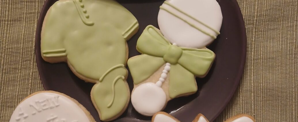 baby shower a new chapter themed decorated cookies