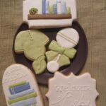 baby shower a new chapter themed decorated cookies