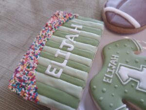 first down first birthday boy decorated cookie ensemble